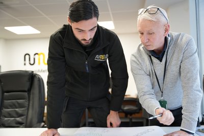 2 staff desk discussion